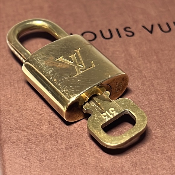 Louis Vuitton Gold Lock w/ Key 313